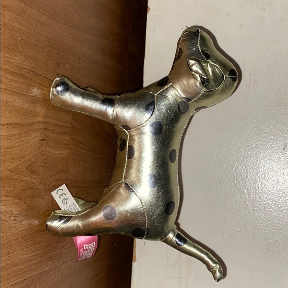 Gold spotted Victoria secret dog